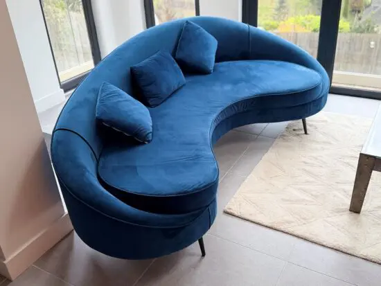 Beautiful Curved Blue Velvet Sofa – Statement Living Room Piece
