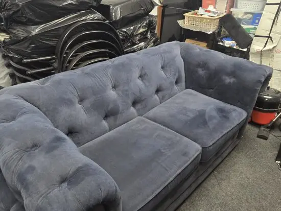 DFS Navy Blue Chesterfield Sofa Bed and matching Footstool