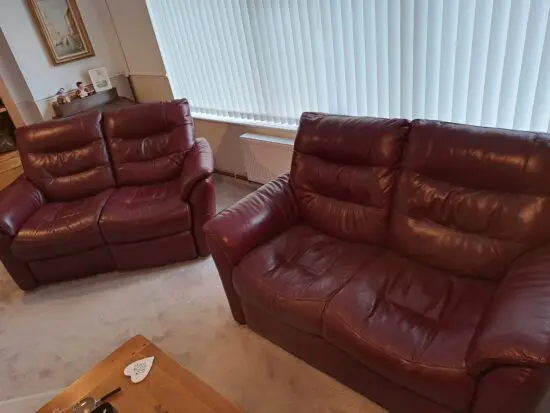 Pair of burgundy Sofology 2 seater leather sofas