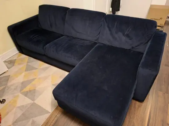 Natuzzi L shape sofa bed in blue