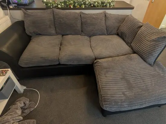 Grey and black corner sofa