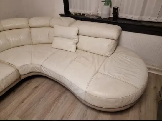 Corner sofa with swirling chair