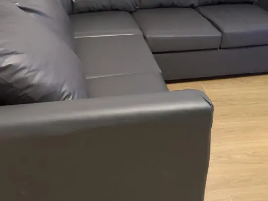 Grey leather look corner sofa