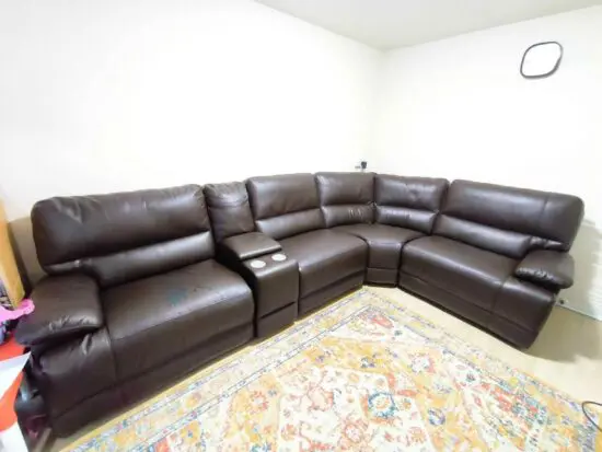 L shape brown reclining sectional sofa.