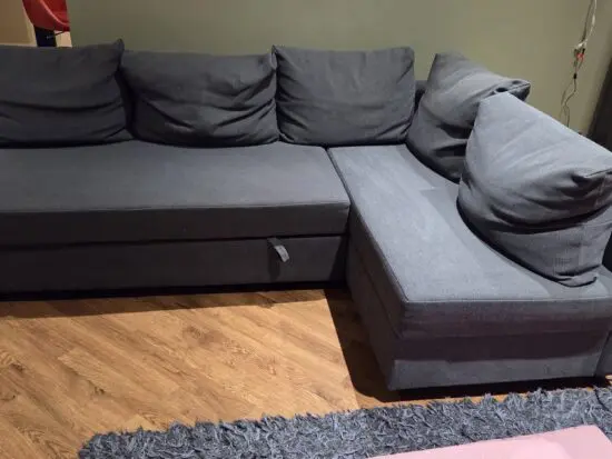Corner sofa with bed and built in storage box