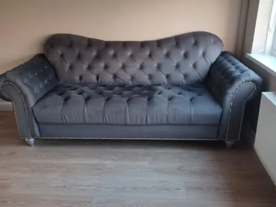 Grey velour sofa