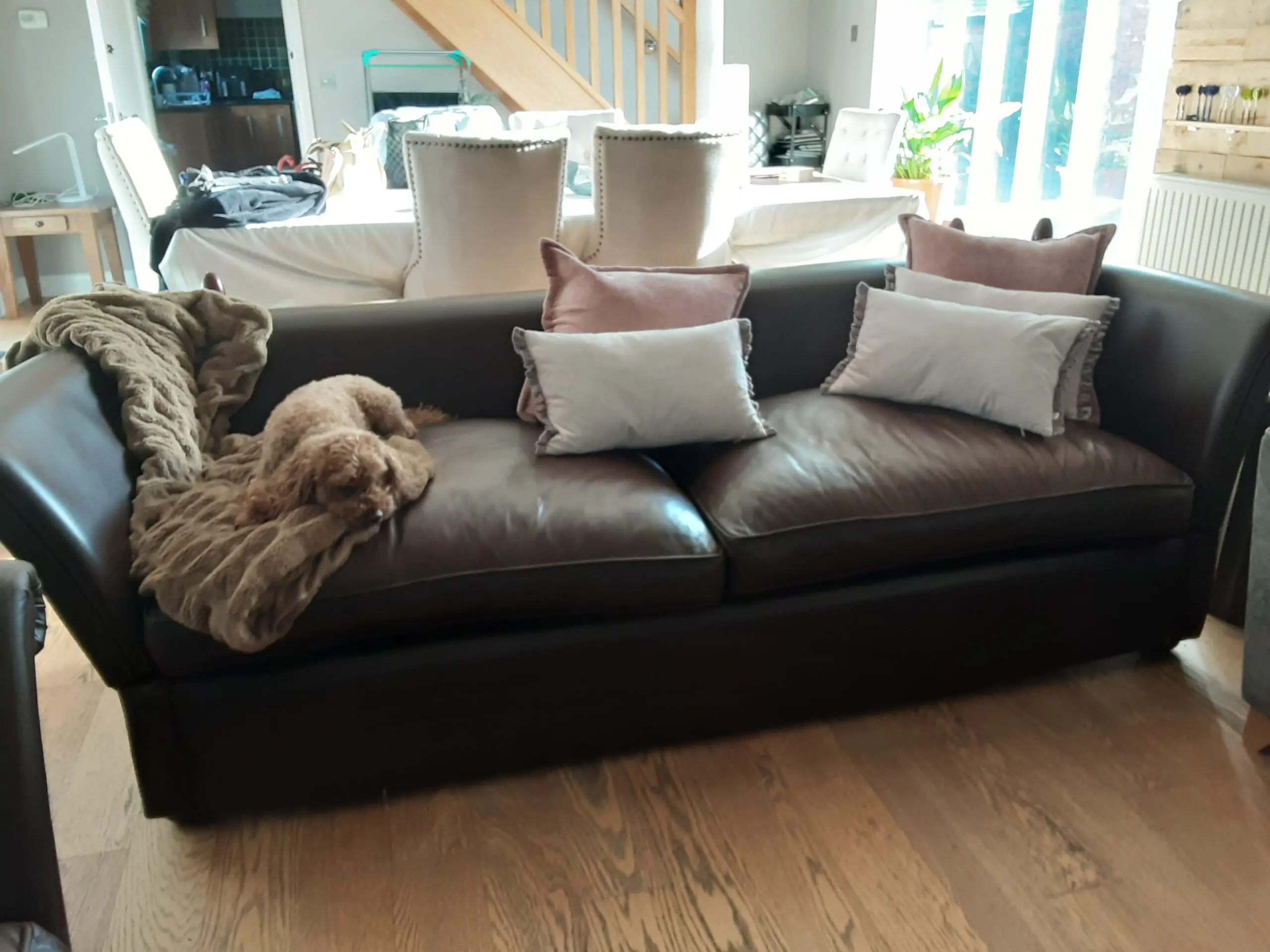 A PAIR OF LARGE LAURA ASHLEY LEATHER SOFAS in BROWN