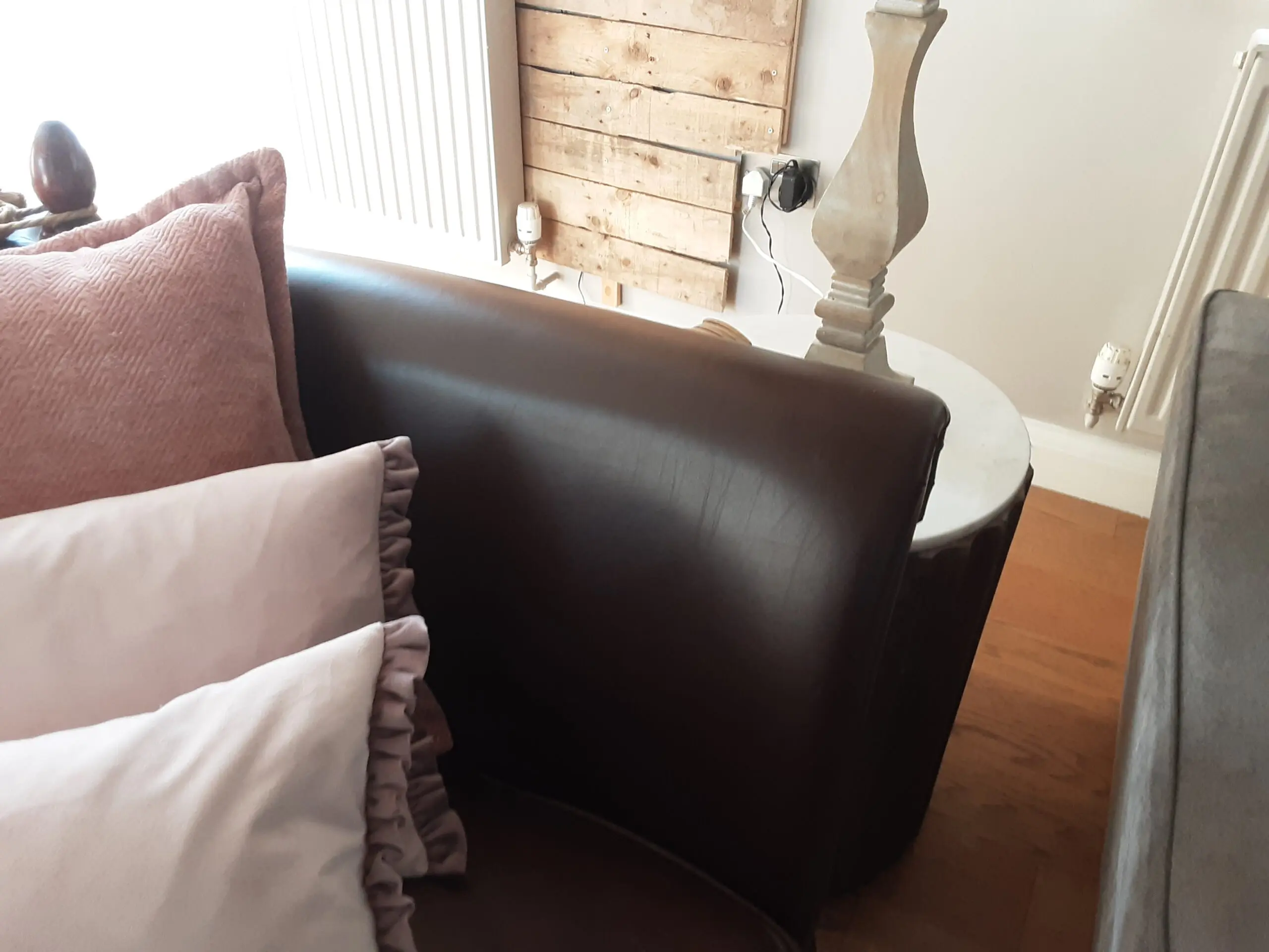 A PAIR OF LARGE LAURA ASHLEY LEATHER SOFAS in BROWN