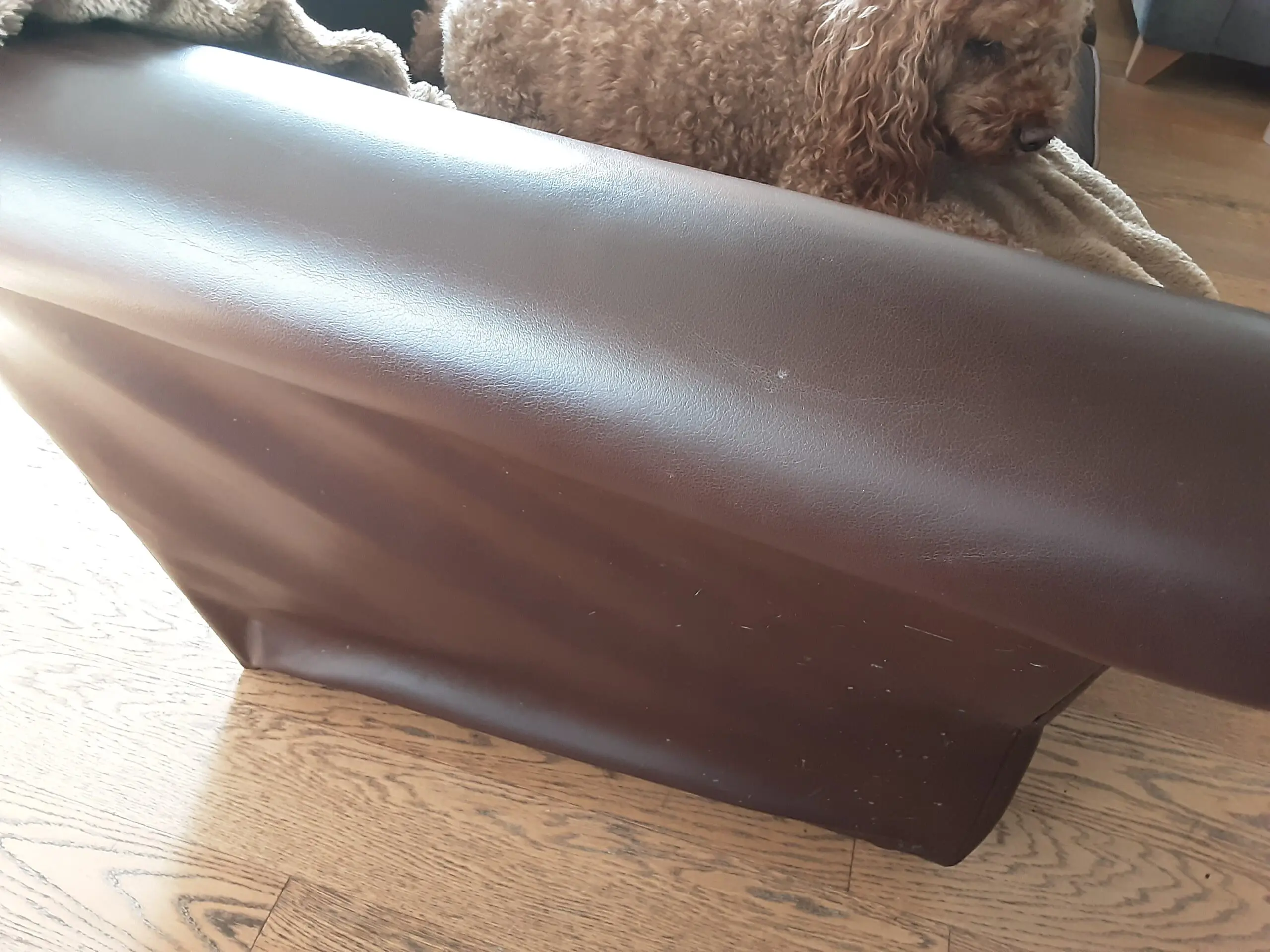 A PAIR OF LARGE LAURA ASHLEY LEATHER SOFAS in BROWN