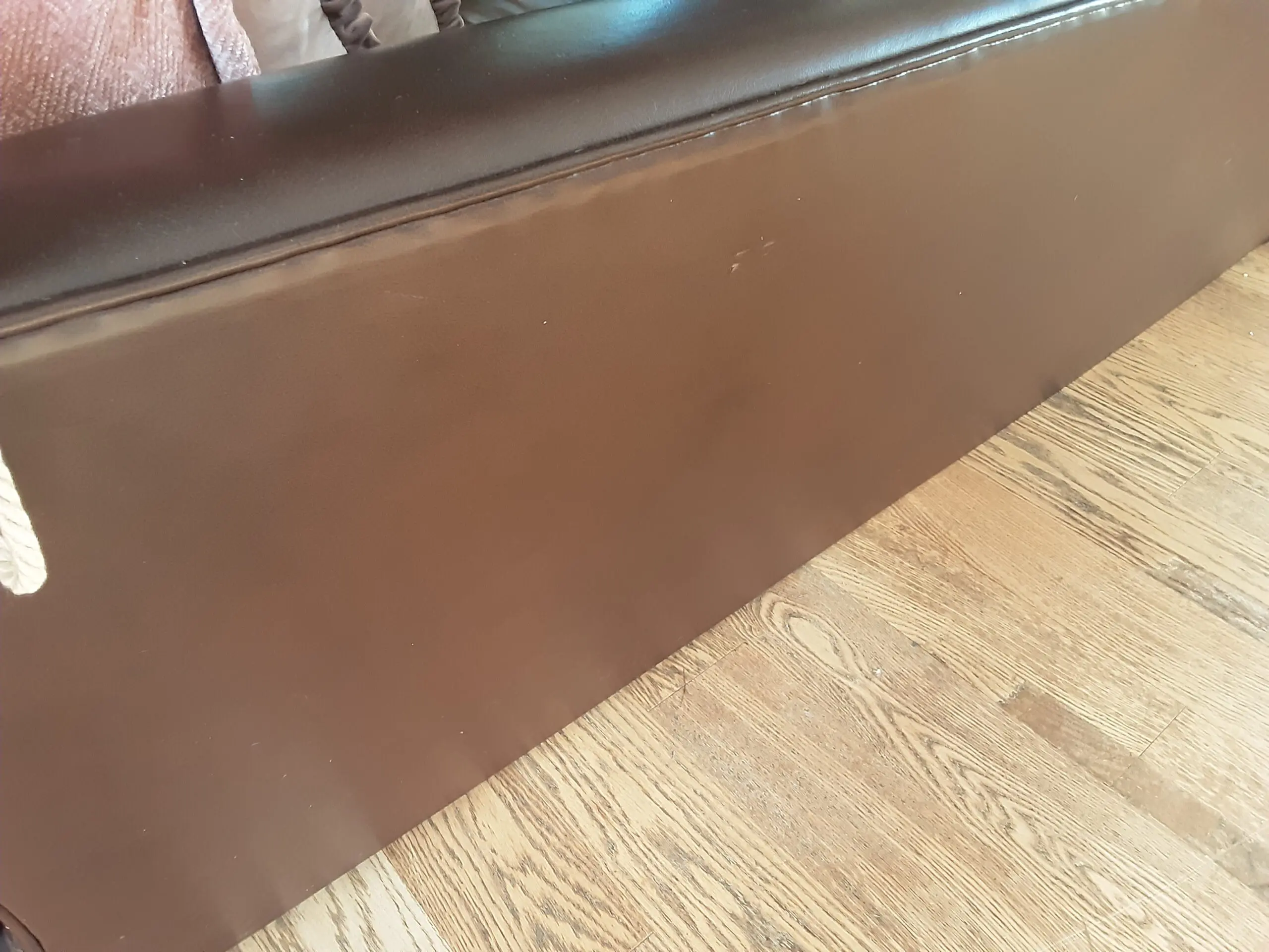 A PAIR OF LARGE LAURA ASHLEY LEATHER SOFAS in BROWN