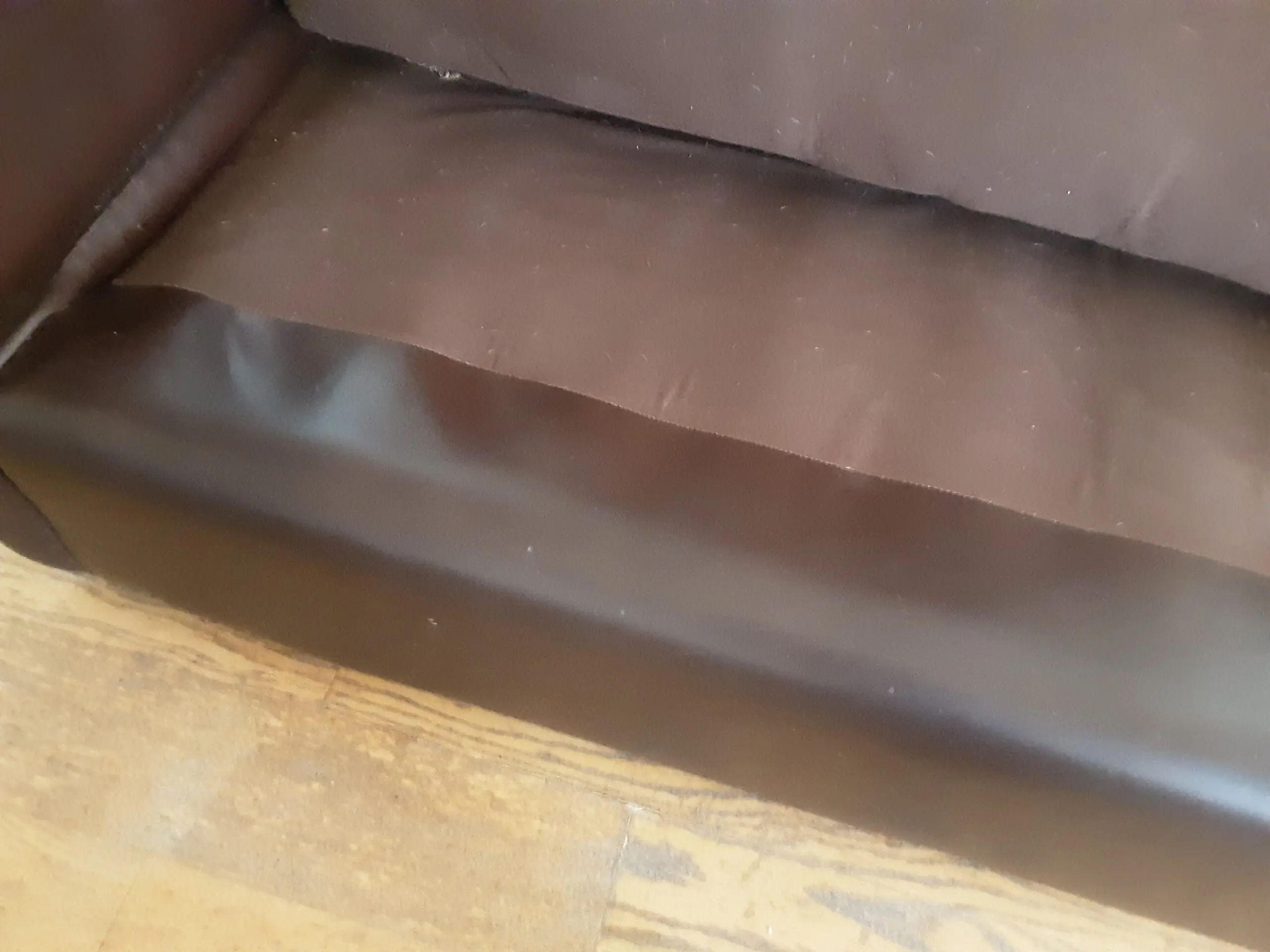 A PAIR OF LARGE LAURA ASHLEY LEATHER SOFAS in BROWN