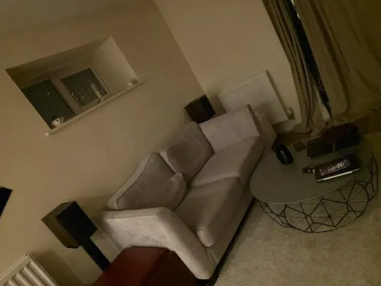 Grey two seater sofa