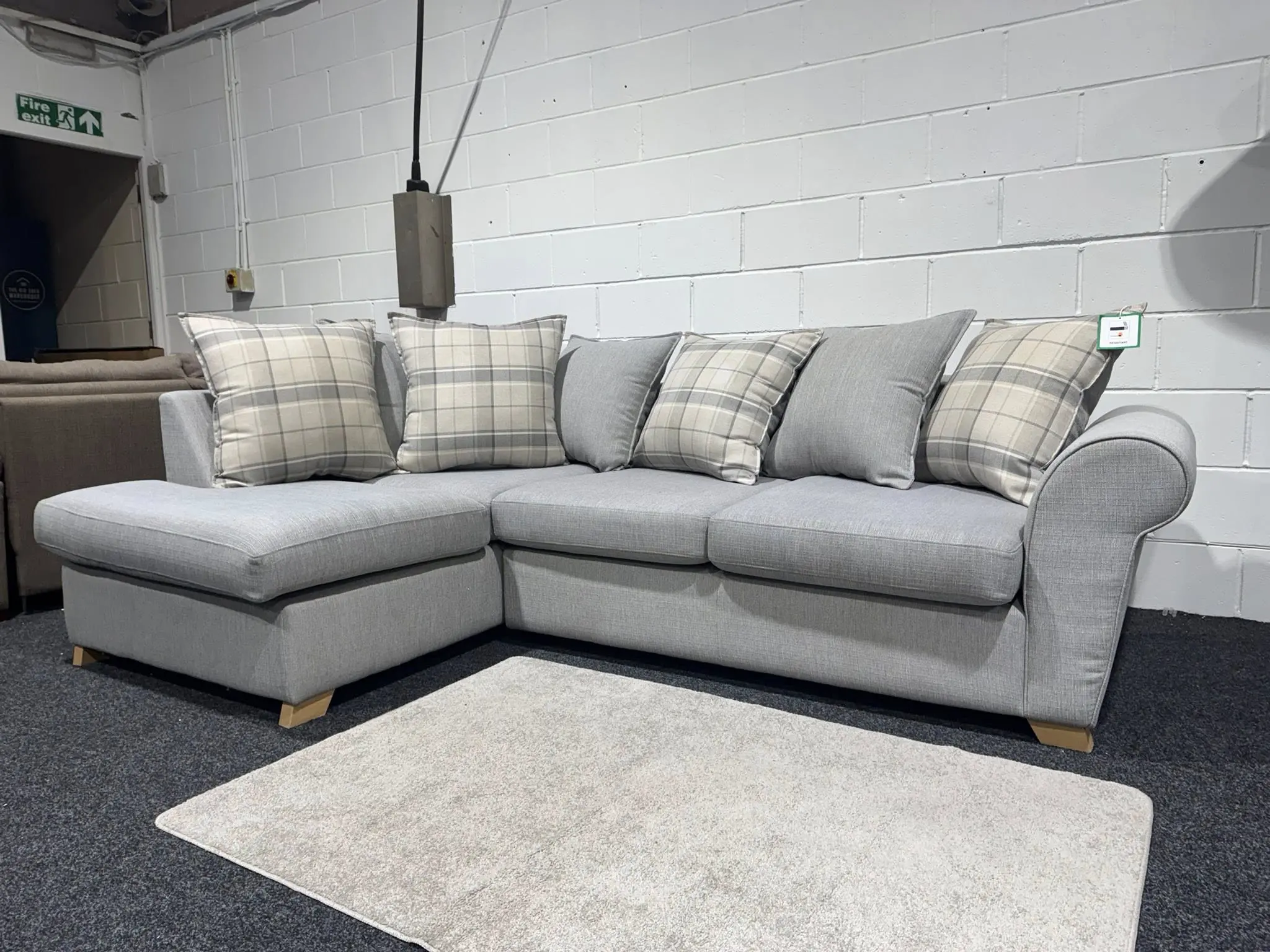 DFS Light Grey L Shape Corner Sofa With Pattern Cushions