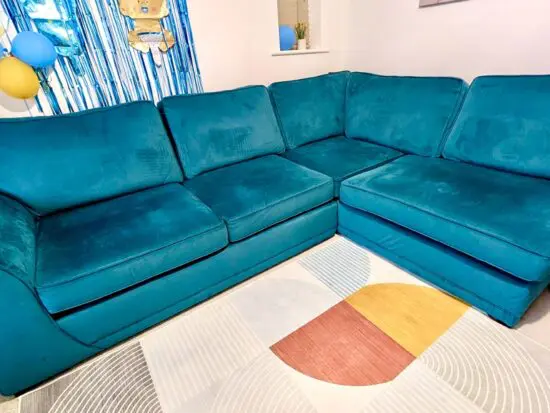 DFS Teal velvet finish corner sofa