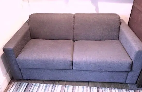 Lario, made in Italy. Charcoal. Two seater sofa bed. Purchased 'Seriously Sofas' London.
