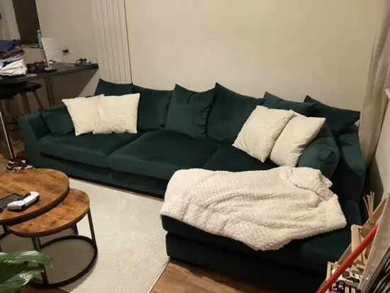 DFS Green velvet corner sofa