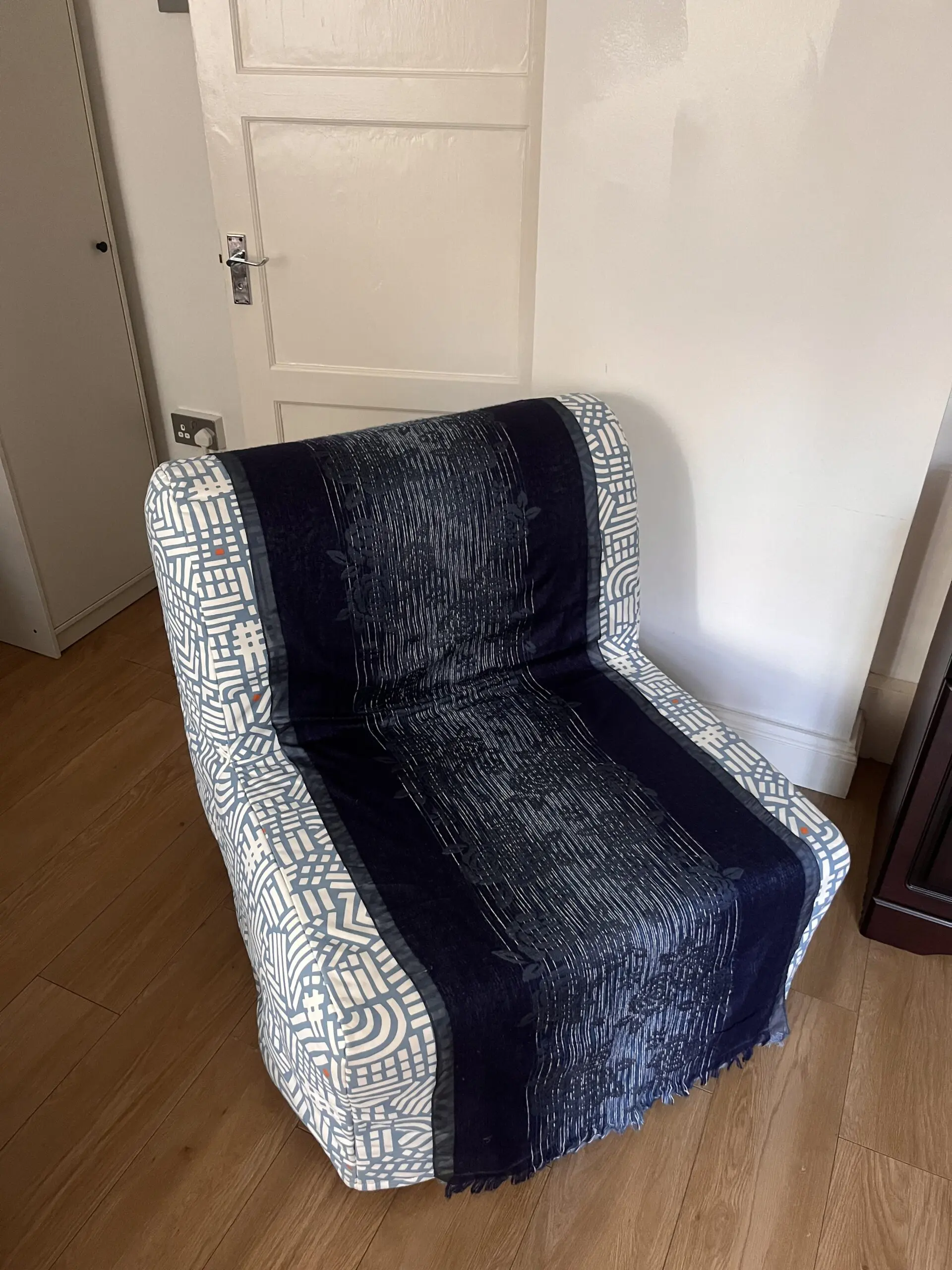 Blue-white IKEA chair bed