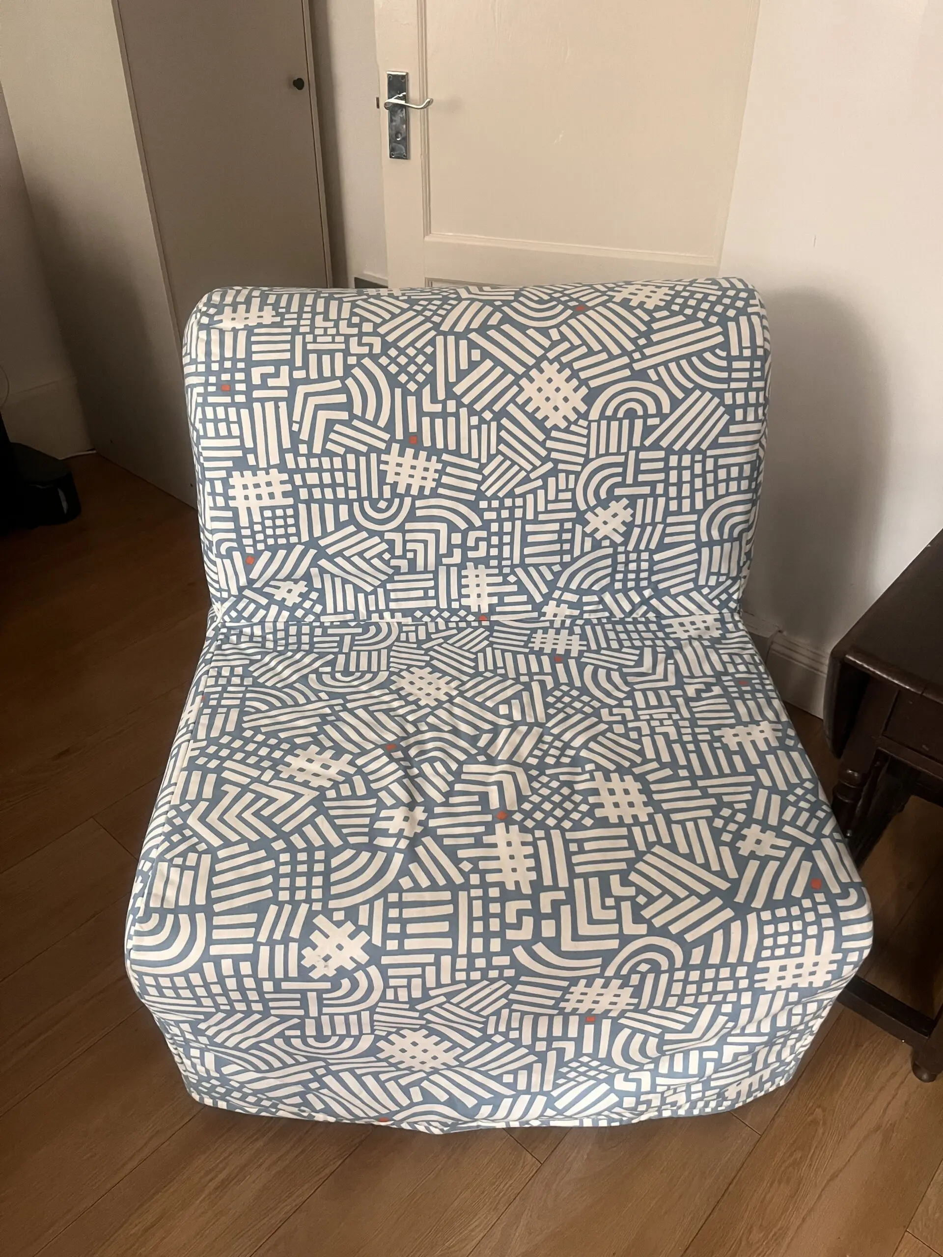 Blue-white IKEA chair bed