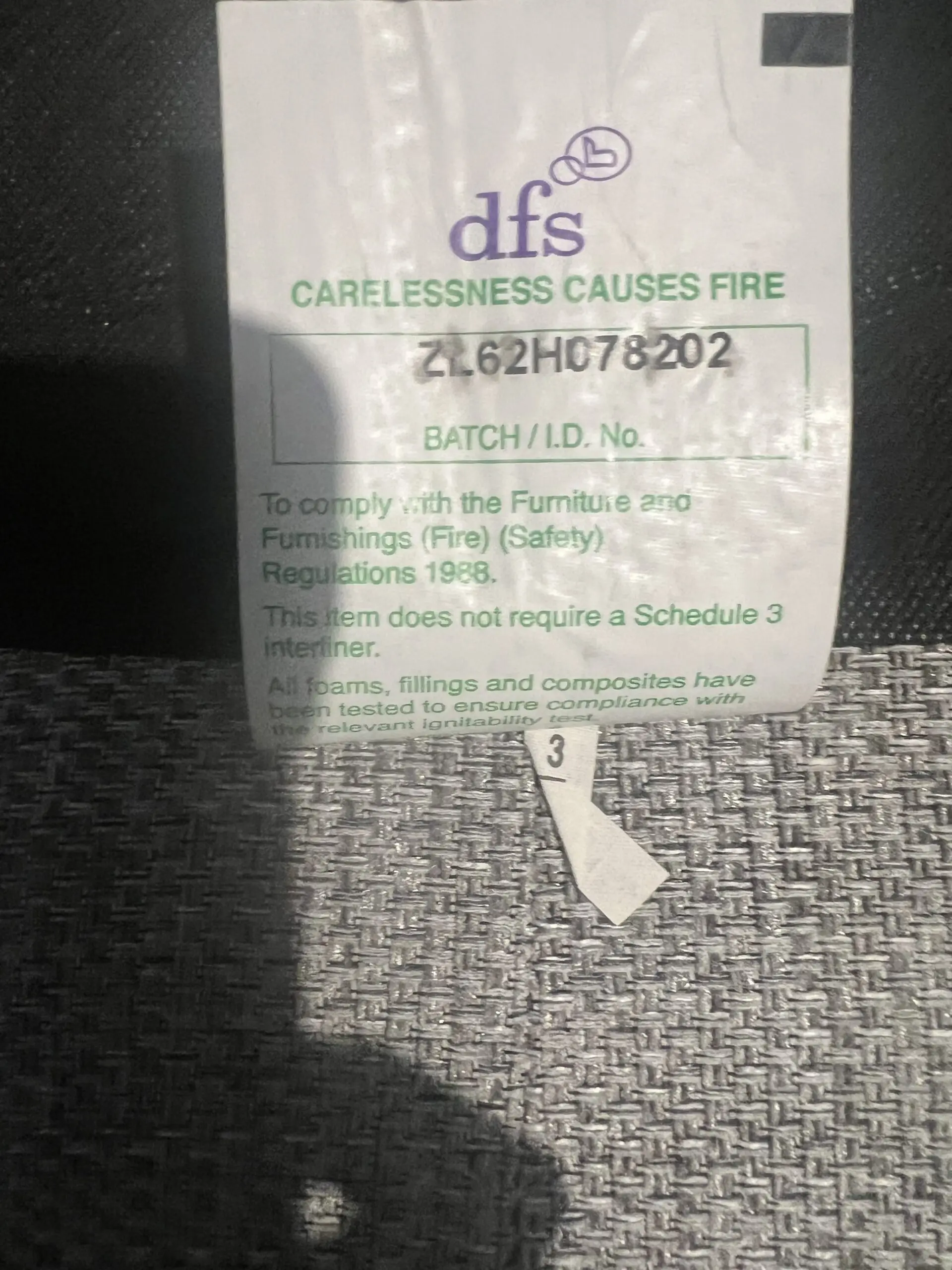 Grey DFS bay window -style sofa with thro pillows