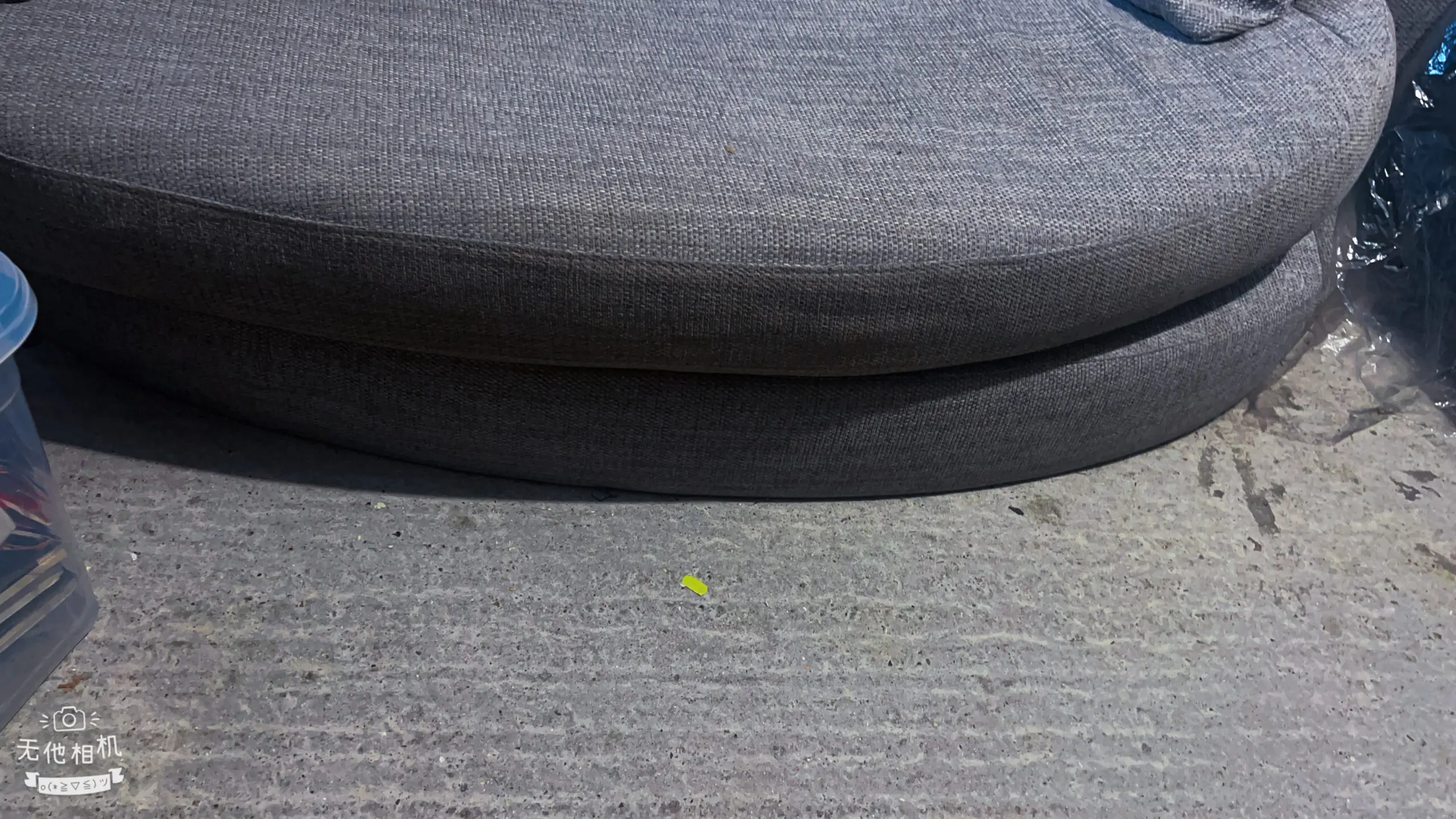 Grey DFS bay window -style sofa with thro pillows