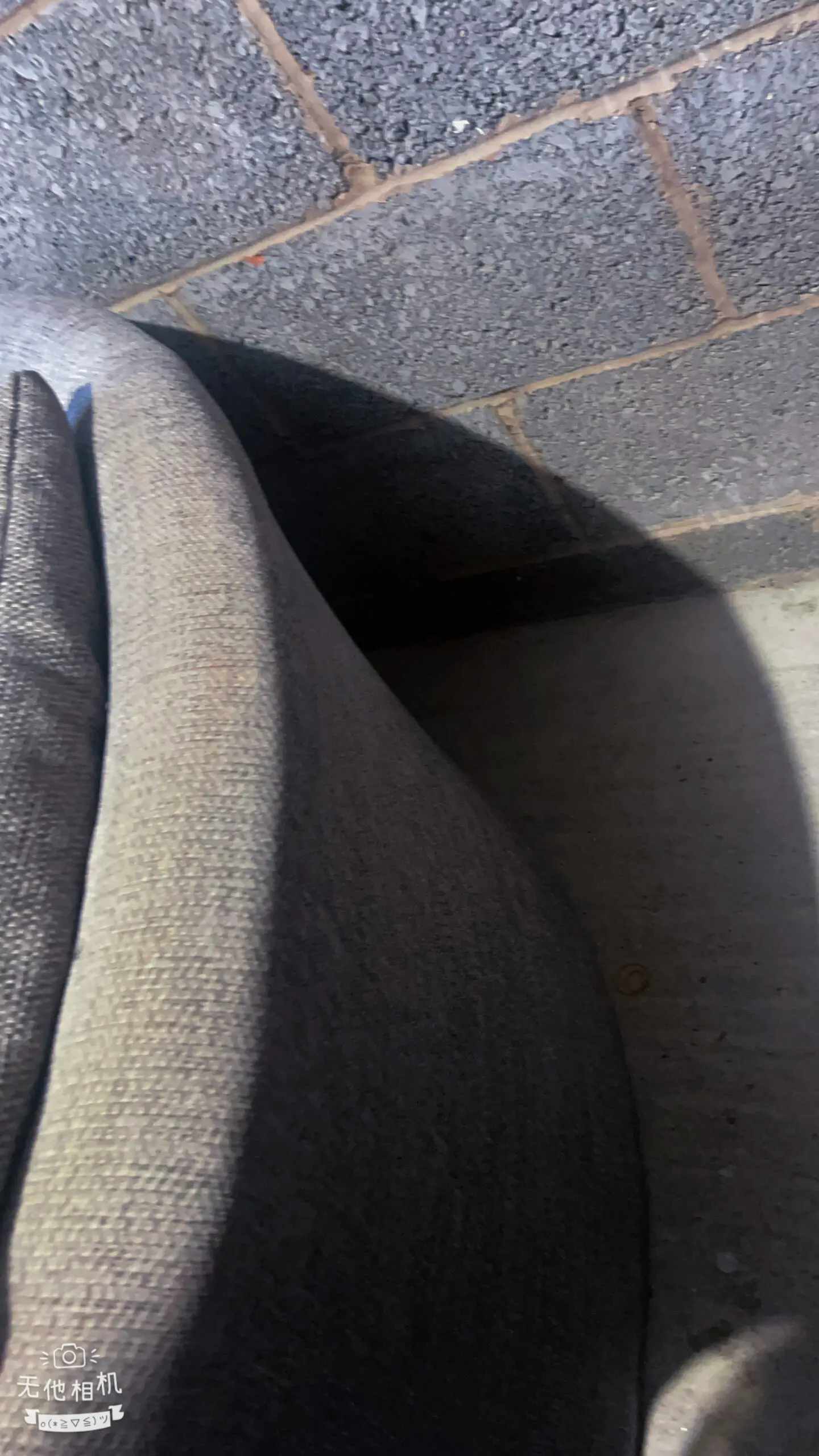 Grey DFS bay window -style sofa with thro pillows