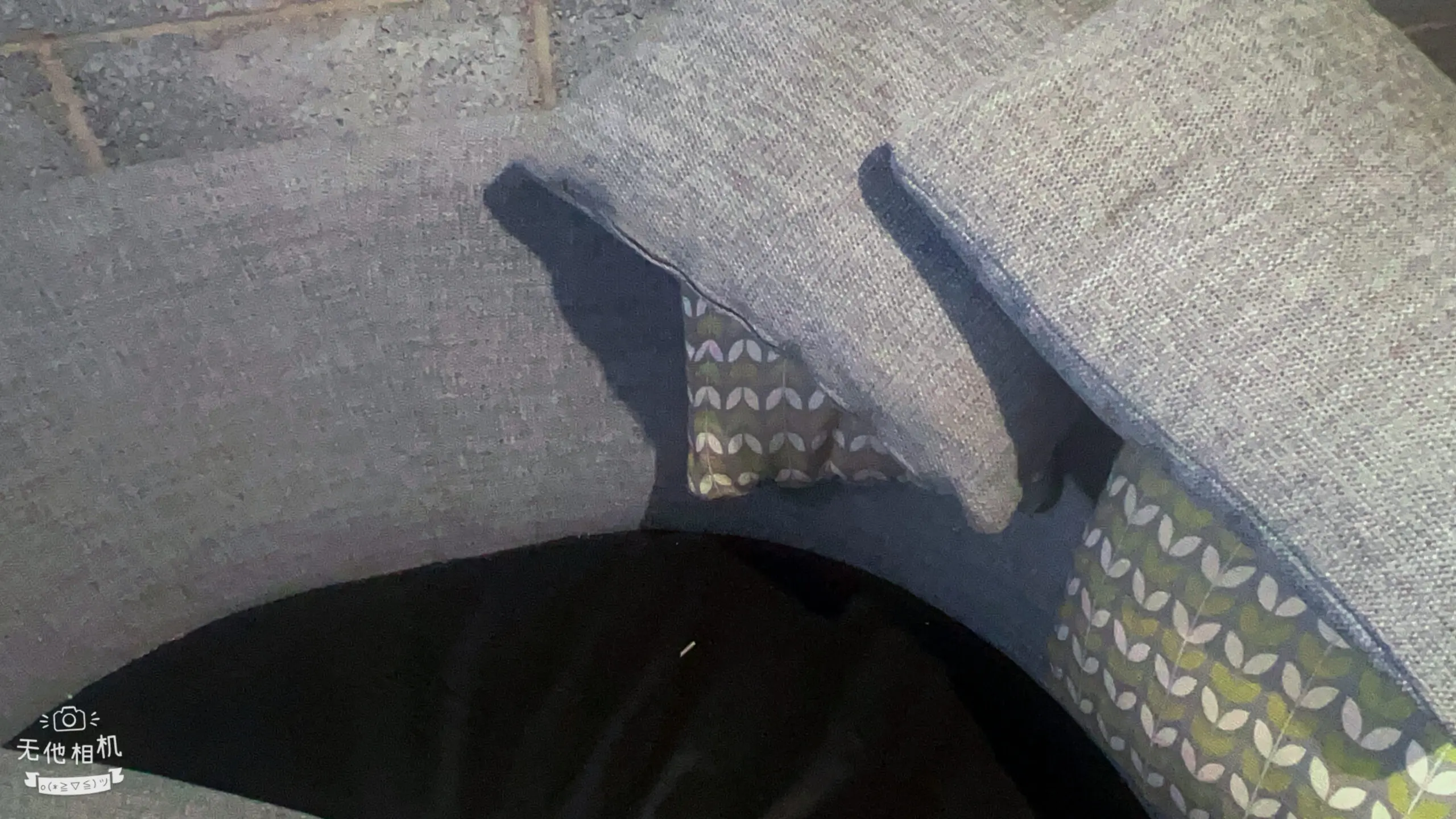 Grey DFS bay window -style sofa with thro pillows