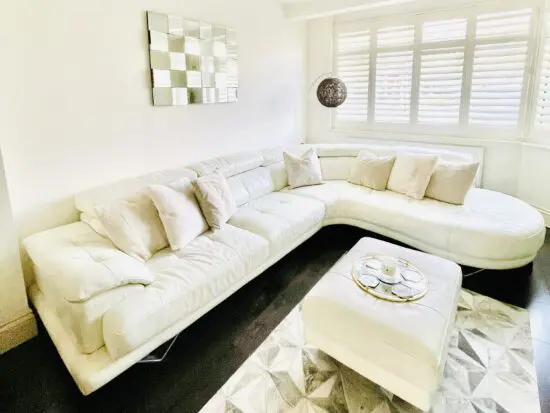 DFS, ivory premium Italian leather corner sofa.