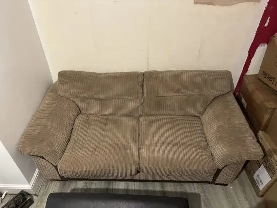 DFS Brown Cord Sofa Bed with matching footstool and 2 scatter cushions