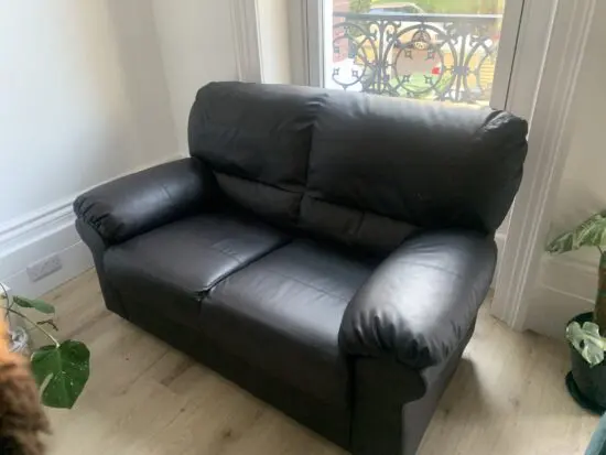 Two brown like leather sofas
