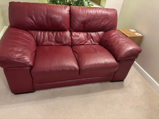 Sterling furniture 2 seat red leather sofa