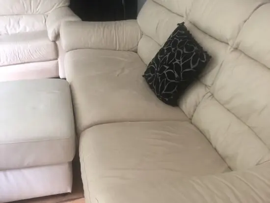 Italian leather cream sofas and footstool