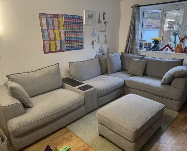 DFS Rowe Cinema sound corner sofa with two foot stools.