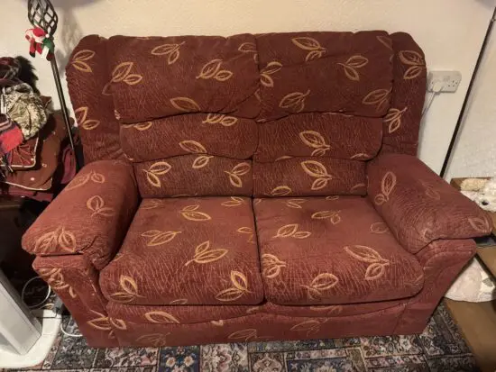 Red two seater couch and chair