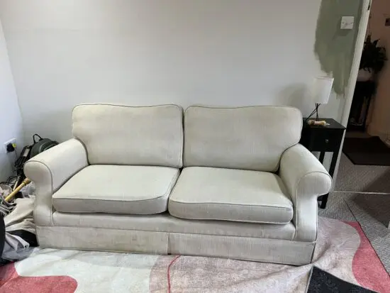 Cream 2 seater sofa