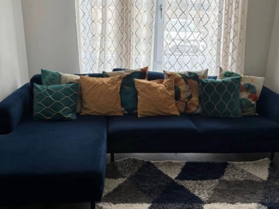 Blue corner sofa in excellent condition