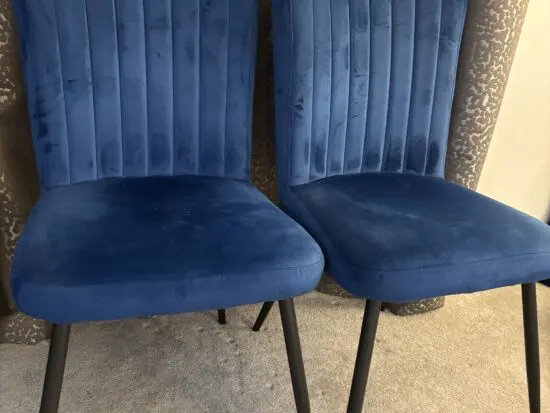 This is a staple Dunelm blue velvet chair in excellent condition