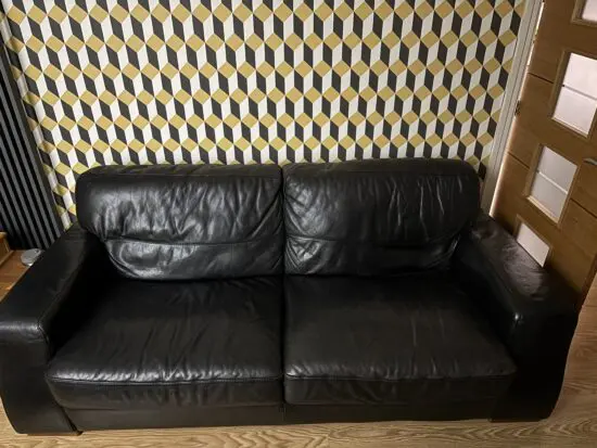 Black leather sofa and chair