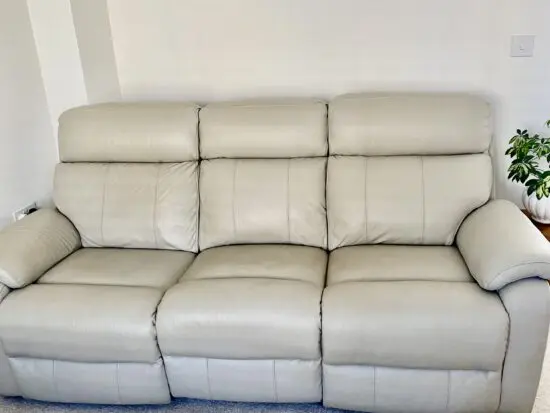 DFS Leather reclining sofas (pair)