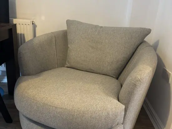 DFS grey swivel chair