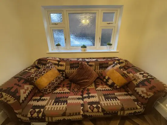 Tetrad aztec leather/fabric sofa