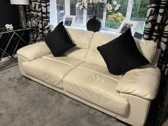 Selling 2 x 3 seater modern real leather sofas from DFS