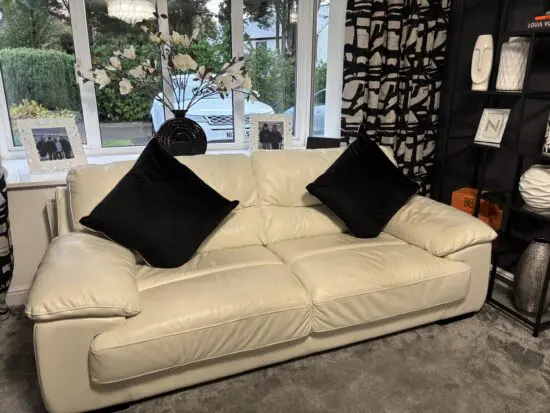 2 x Three seater real leather DFS sofas for sale