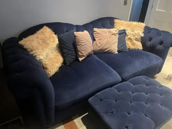 Joules dark blue velvet sofa