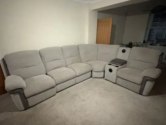 SCS grey large sofa with built in cup holders and Bluetooth speaker