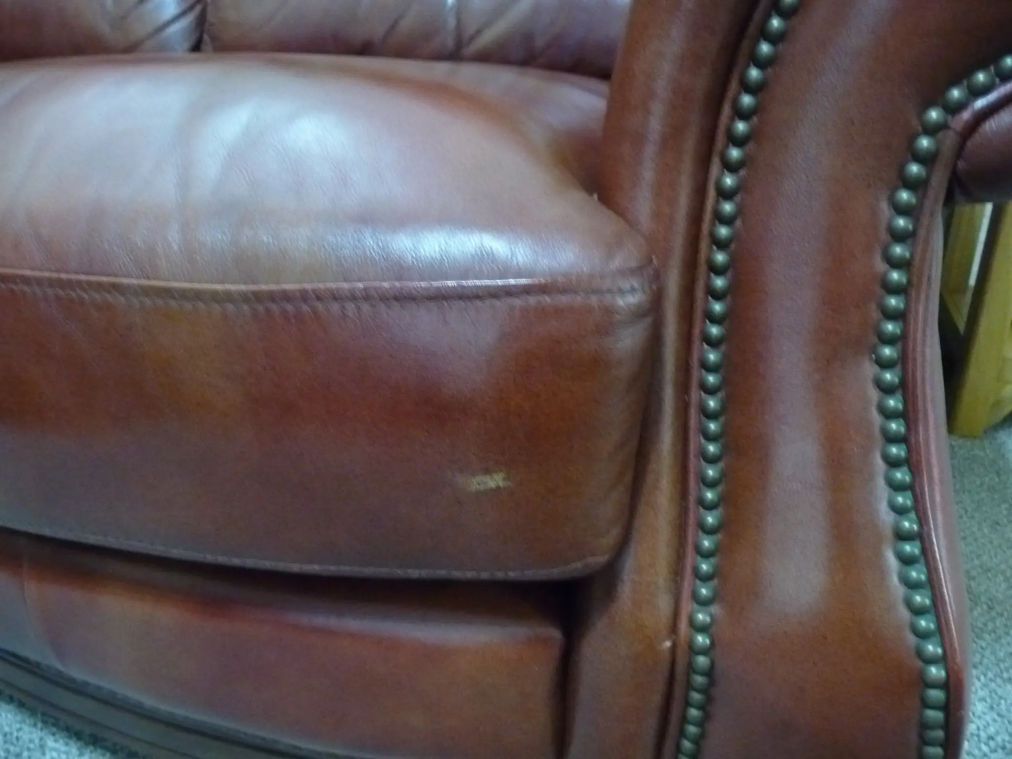 Quality leather 2 seater dark tan sofa and single chair.