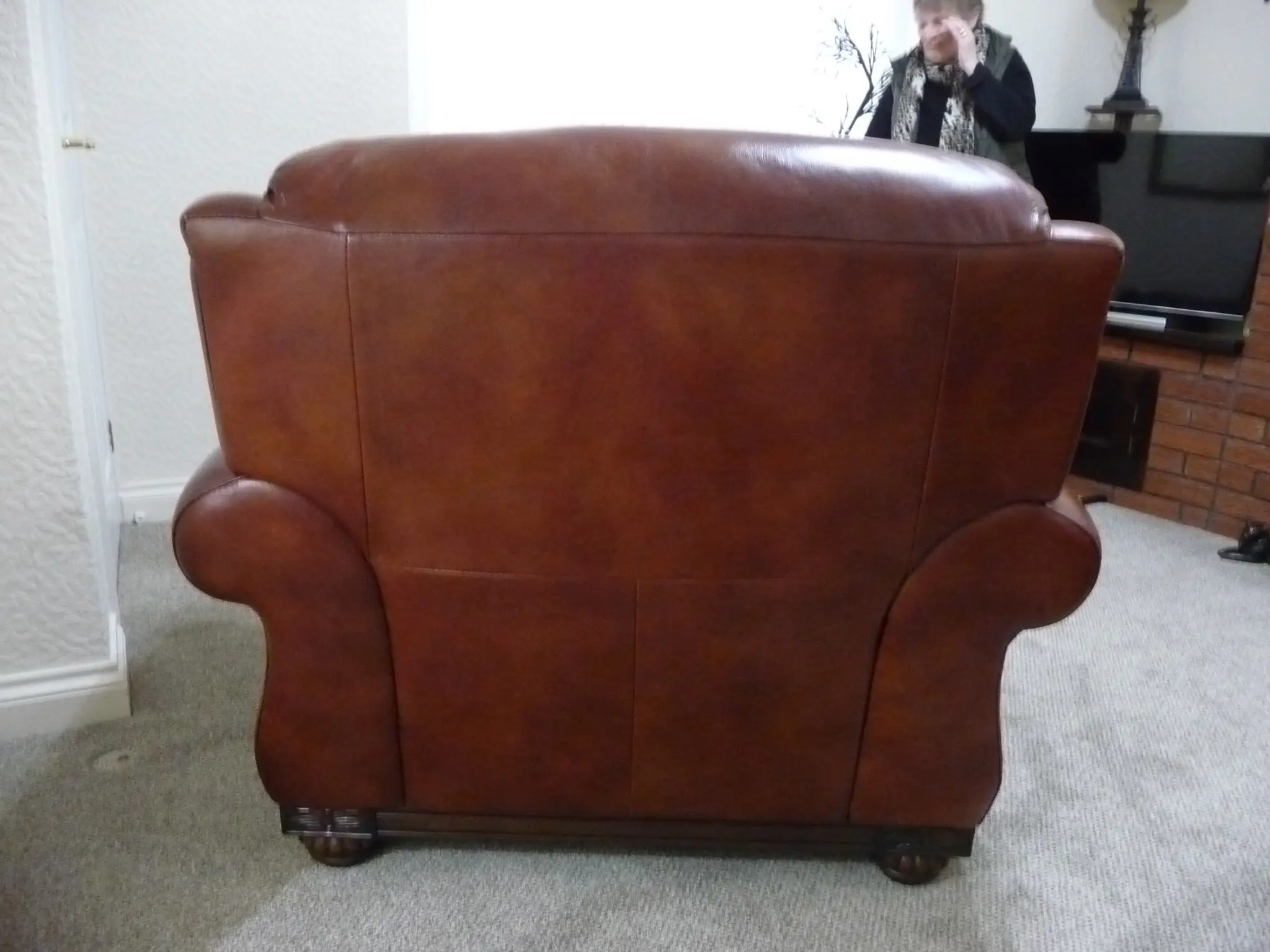 Quality leather 2 seater dark tan sofa and single chair.