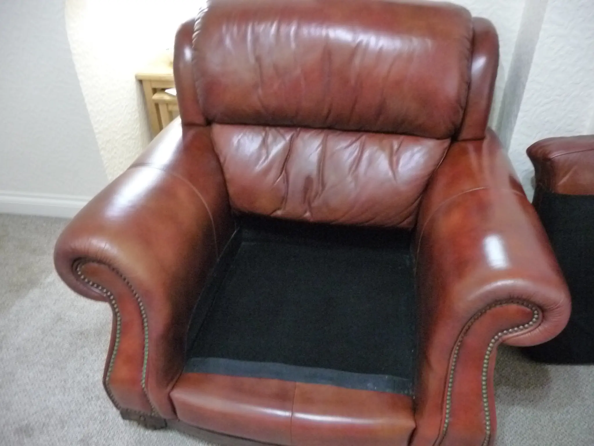 Quality leather 2 seater dark tan sofa and single chair.