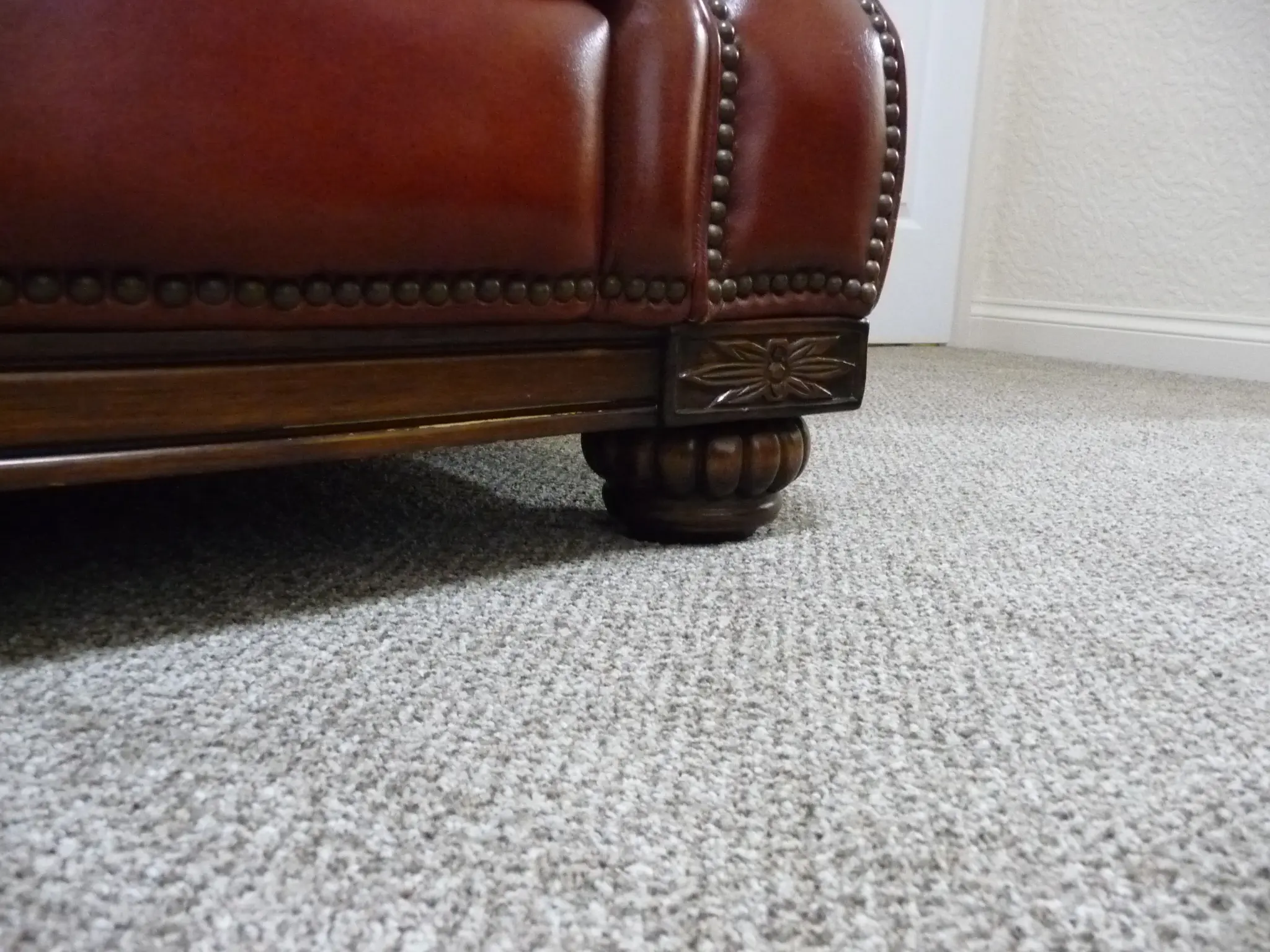 Quality leather 2 seater dark tan sofa and single chair.