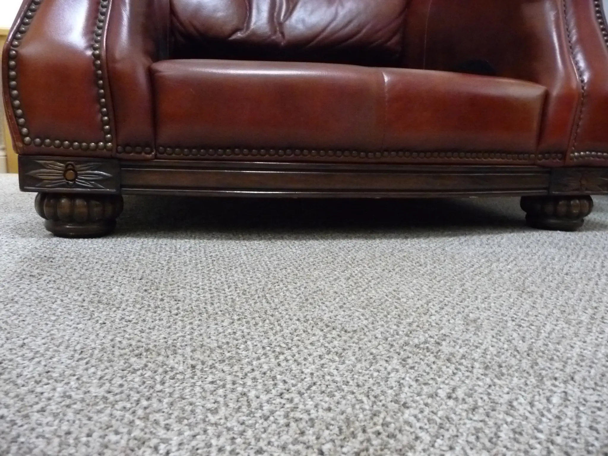 Quality leather 2 seater dark tan sofa and single chair.