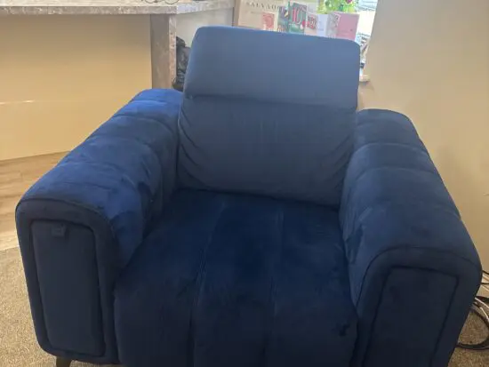 Torren Power recliner arm chair. Blue velvet